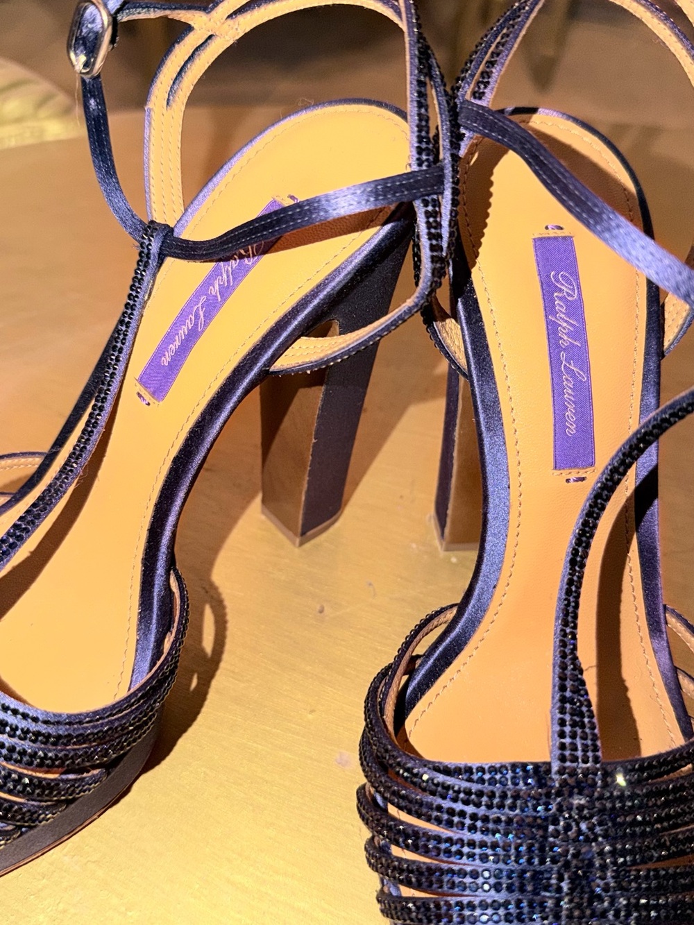 Ralph Lauren Navy Crystal Heeled Sandals/Selena Gomez wore the white/silver.